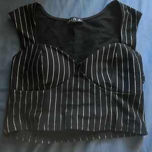 Cropped/short black and white striped top
Size M Worn only once